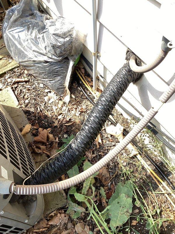 Completed annual cooling maintenance on 25-year-old American Standard air conditioning system. Performed comprehensive inspection of indoor air handler components including condensate drain pan, PVC drain lines, refrigerant lines, and electrical connections, all found in satisfactory operating condition. Inspected outdoor condenser unit and associated refrigerant line set; noted accumulation of leaves and debris around equipment exterior which was documented for customer awareness regarding airflow maintenance.