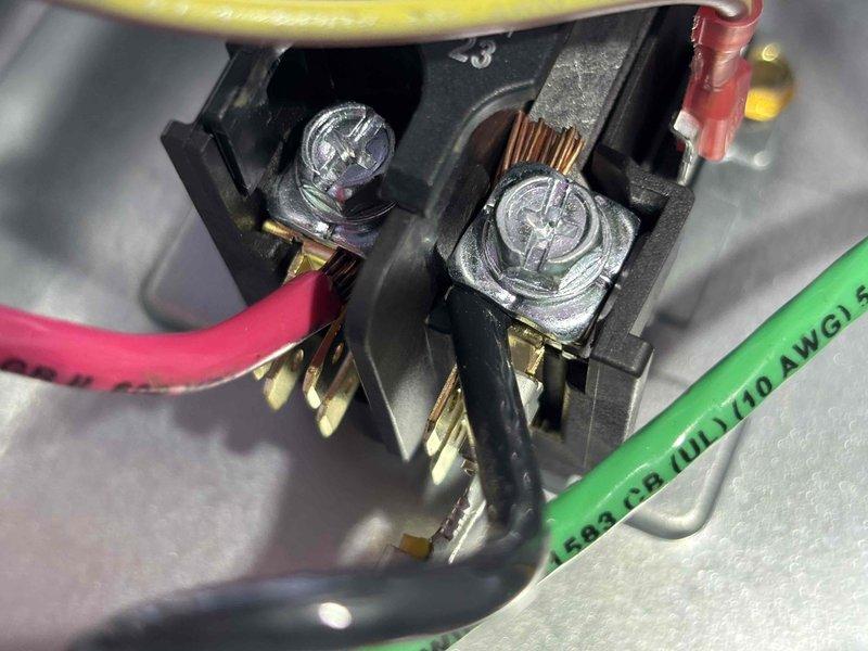 # No Cool Service Call - Carrier AC Unit

Responded to service call for air conditioning system with non-operational outdoor fan motor. Upon arrival, performed diagnostic evaluation of 0-year-old Carrier unit. Inspection revealed failed run capacitor preventing condenser fan motor operation while compressor attempted to run.

Accessed electrical compartment and tested capacitor with multimeter, confirming complete capacitor failure with no measurable capacitance. Disconnected power and safely discharged residual voltage from failed component. Removed defective dual run capacitor from mounting bracket and terminal connections.

Installed new OEM-equivalent dual run capacitor with proper microfarad and voltage ratings for unit specifications. Connected all electrical terminals according to wiring diagram: HERM terminal to compressor, FAN terminal to condenser fan motor, and COM terminal to common line. Verified all wire connections were secure with appropriate torque on terminal screws.
