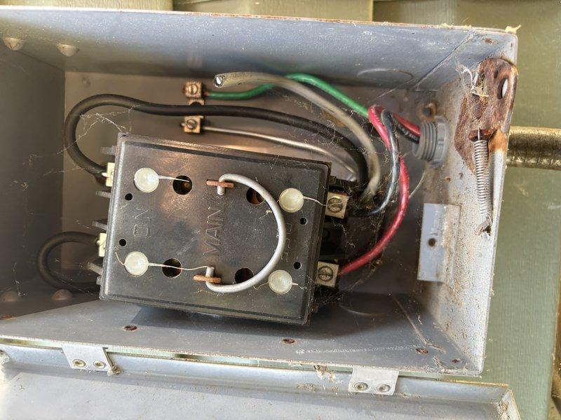 Completed annual cooling maintenance on Rheem system as part of 5-year tune-up program. Performed comprehensive inspection of outdoor condensing unit including electrical disconnect panel, contactor operation, and wiring connections; noted significant rust and corrosion on disconnect enclosure and mounting hardware due to weather exposure. Inspected indoor air handler and furnace components in basement mechanical room, verified proper operation of all HVAC equipment, and documented system condition with photographs for service records.