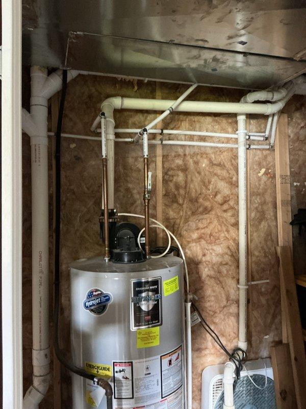 Performed comprehensive inspection and evaluation of existing 2016 Bradford White 50-gallon power-vent natural gas water heater to assess current condition and operational status. Unit showing no reported symptoms or issues at time of visit. Documented installation configuration including power-vent assembly, gas connections, plumbing connections, and surrounding utility area conditions through photographic documentation. Provided detailed consultation regarding replacement options, presenting specifications and efficiency comparisons between high-efficiency 50-gallon natural gas units and 50-gallon heat-pump hybrid electric models. Reviewed available utility rebate programs through Consumers Energy and Lansing Board of Water and Light for qualifying high-efficiency and heat-pump water heater installations. Discussed coordination of separate faucet installation work to be scheduled during future replacement visit. Prepared comprehensive estimate with equipment options and installation 