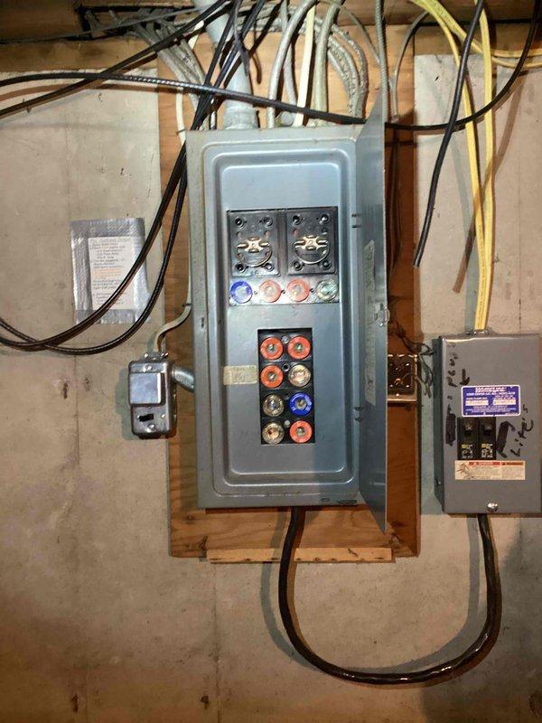 Conducted comprehensive in-home estimate for complete HVAC system replacement including 16-year-old furnace and central air conditioning unit. Evaluated existing electrical infrastructure, documenting current fuse panel configuration and assessing feasibility of upgrading to modern circuit breaker panel to support new furnace installation requirements. Photographed existing electrical panel showing multiple circuit breakers, main service connections, and associated wiring, as well as control systems and aged cast iron piping in basement utility area to determine compatibility with proposed equipment upgrades.