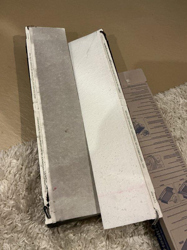 Responded to service call for water leak and drainage issue on 3-year-old EnergiAir system that was cooling but not removing humidity properly. Inspected HVAC system and determined clogged air filter was restricting airflow and preventing proper condensation drainage. Replaced dirty, debris-laden air filter with new pleated filter to restore proper system airflow, humidity removal, and condensate drainage function.