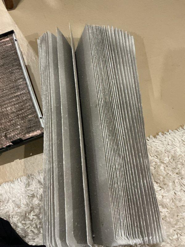 Responded to service call for water leak and drainage issue on 3-year-old EnergiAir system that was cooling but not removing humidity properly. Inspected HVAC system and determined clogged air filter was restricting airflow and preventing proper condensation drainage. Replaced dirty, debris-laden air filter with new pleated filter to restore proper system airflow, humidity removal, and condensate drainage function.