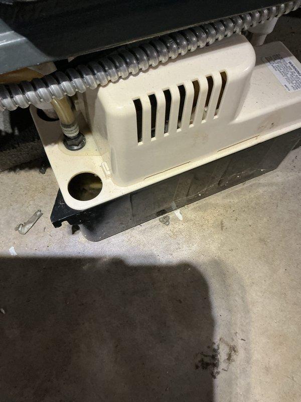 Completed annual cooling maintenance on a 7-year-old air conditioning system with horizontal air handler located in basement crawl space. Performed comprehensive system inspection, verified proper operation of all components, checked refrigerant levels, cleaned condensate drain system, and documented equipment condition with photos showing air handler unit and associated ductwork in good working order.