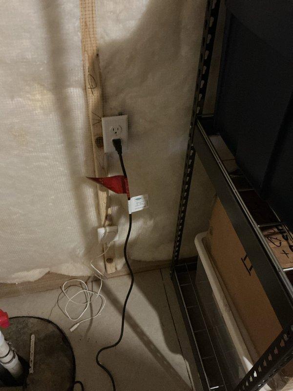 Responded to complaint of sump pump running constantly with excessive noise audible throughout home. Upon inspection, found pump cycling continuously despite low water level in basin, indicating faulty float switch. Customer had unplugged unit to prevent damage from dry running. Tested pump operation, confirmed float mechanism failure causing pump to activate regardless of water level. Documented existing installation showing submersible pump in basin with standing water and sediment accumulation. Recommended float switch replacement or full pump replacement to restore proper automatic operation and eliminate noise issue.