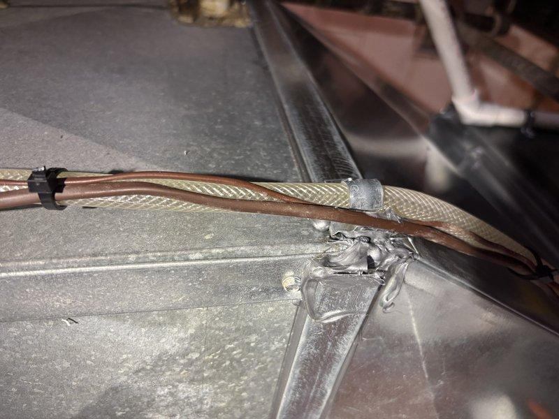 Completed annual cooling maintenance on 15-year-old AMANA system. Performed comprehensive tune-up including inspection of refrigerant lines, ductwork connections, and mechanical components. All braided line connections and mounting hardware verified secure, system operating within normal parameters.