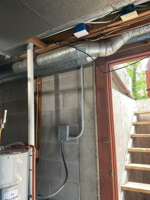 Successfully installed a 50-gallon electric water heater in the basement utility area, complete with proper electrical connections and plumbing integration. Installed a new sump pump system with PVC discharge piping and flexible hose routing to manage groundwater effectively. Added an expansion tank to the water heater system to protect against thermal expansion and maintain proper system pressure, ensuring all components meet current plumbing code requirements.