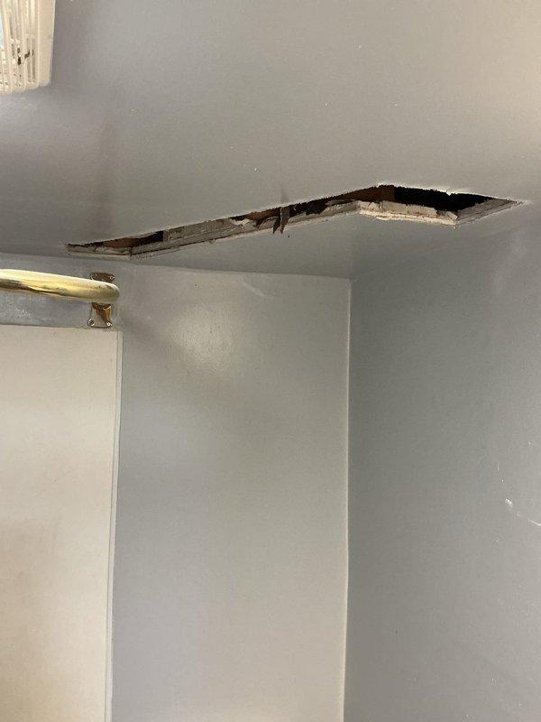 Replaced failed kitchen drain line that was leaking within the ceiling cavity. Accessed the damaged piping by opening the ceiling, removed the deteriorated section, and installed new PVC drainage pipe with proper slope and connections. Restored water-tight drainage system; drywall repair required by separate trade.