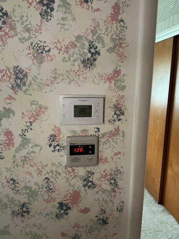 Responded to no cooling call on 11-year-old EnergiAir system. Found condensate drain pan completely blocked with debris and biological growth, causing safety float switch activation and system shutdown. Removed and cleaned drain pan, cleared condensate line, tested float switch operation, and verified proper drainage. System restored to normal operation with adequate airflow and cooling capacity.
