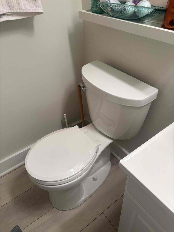 Completed partial toilet installation as part of ongoing project. Customer requested different toilet model than initially installed, requiring return visit to complete final installation with alternative unit currently at shop. Removed and prepared area for replacement fixture. Work completed without issues in 1.5 hours.