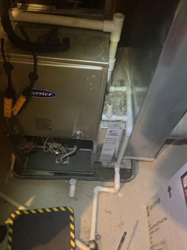 Responded to service call for non-functioning Nest thermostat that would not hold charge. Upon inspection of the Carrier furnace system, diagnosed faulty C-wire (common wire) connection at the HVAC control board. Verified proper 24VAC power supply, cleaned and re-terminated the C-wire connection at both the furnace terminal strip and thermostat base. Tested thermostat functionality and confirmed proper charging and communication with the heating and cooling system. Unit now operating normally with stable power supply to thermostat.