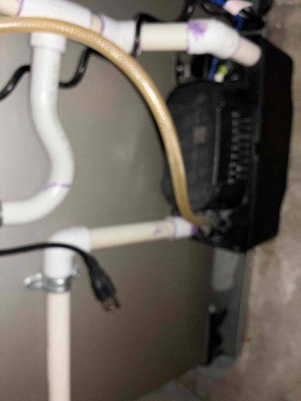 Responded to service call for HVAC unit experiencing short cycling and thermostat error following recent tune-up. Upon arrival, inspected water heater and associated mechanical systems including PVC drainage lines, condensate connections, and electrical components. Diagnosed issue with condensate pump operation affecting system cycling. Verified proper electrical connections, tested pump functionality, and ensured drainage lines were clear and properly configured. Reset system controls, cleared thermostat error code, and confirmed unit returned to normal operation without repeated start/stop cycling. System tested and left in proper working condition under existing warranty coverage.