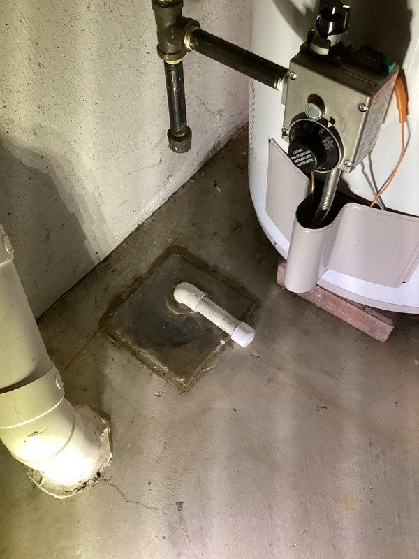 Completed QUOTR-quoted repair for condensate pump system in basement mechanical room. Installed new condensate pump assembly with PVC discharge piping connected to floor drain to handle HVAC condensate removal. Verified proper pump operation, tested float switch functionality, and confirmed adequate drainage flow from air handler unit through white PVC condensate lines to pump reservoir and discharge point.