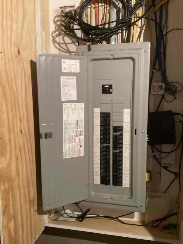 Completed estimate visit for new Generac automatic standby generator installation at 15-year-old single-family residence. Evaluated existing electrical service panel configuration and available space for generator transfer switch integration. Documented current 200-amp main electrical panel with adequate breaker capacity and determined optimal equipment placement for proposed generator system.