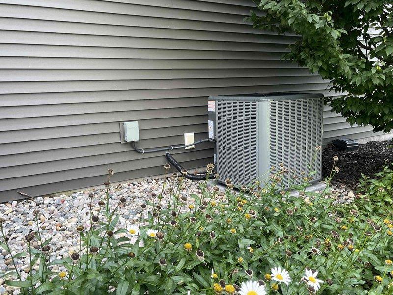 Completed full HVAC system installation including new furnace unit in basement utility area and outdoor condensing unit. Installed all necessary ductwork, PVC venting, refrigerant line sets, and electrical connections per manufacturer specifications. Both units tested and operational, with all components properly secured and integrated into existing home infrastructure.