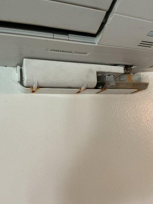Responded to report of water leak and malfunctioning mini-split system with two bedroom units shutting off prematurely after short runtime. Inspected 9-year-old Daikin mini-split system including outdoor condenser unit and indoor wall-mounted air handlers. Documented exterior condenser unit condition and interior components including condensate drainage system and refrigerant lines. System requires further diagnosis to determine cause of intermittent shutdown and water leakage issue.