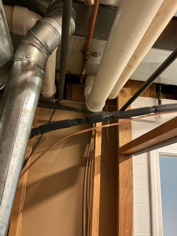 Conducted comprehensive water heater replacement estimate for residential property, evaluating both tankless and traditional tank-style options. Assessed existing installation in basement utility area, documenting current water heater configuration, surrounding HVAC ductwork, plumbing infrastructure including PVC and copper supply lines, and available clearances for equipment replacement. Provided customer with detailed comparison of tankless versus tank water heater solutions to support informed purchasing decision.