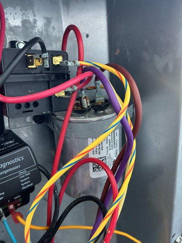 Completed annual cooling system maintenance and diagnostic evaluation on AC unit. Performed comprehensive system testing using CoreSense diagnostic equipment on Copeland scroll compressor to verify operational parameters and compressor health. Inspected and tested capacitor, electrical connections, and control components. All wiring terminals secured and electrical connections verified for proper voltage and amperage. System operating within manufacturer specifications with all diagnostic indicators showing normal operation. Unit tested under load and confirmed proper cooling cycle operation.