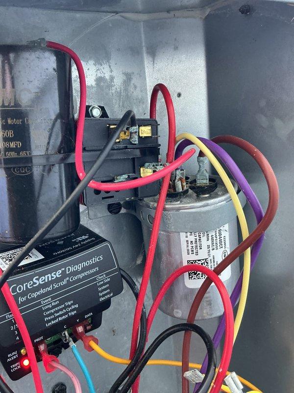 Completed annual cooling system maintenance and diagnostic evaluation on AC unit. Performed comprehensive system testing using CoreSense diagnostic equipment on Copeland scroll compressor to verify operational parameters and compressor health. Inspected and tested capacitor, electrical connections, and control components. All wiring terminals secured and electrical connections verified for proper voltage and amperage. System operating within manufacturer specifications with all diagnostic indicators showing normal operation. Unit tested under load and confirmed proper cooling cycle operation.