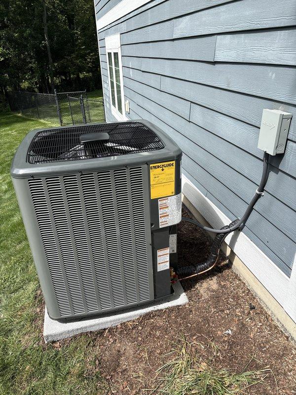 Completed full residential air conditioning system replacement. Installed new outdoor condensing unit on existing concrete pad with proper refrigerant line connections and electrical disconnect. Replaced indoor air handler with associated ductwork connections and PVC condensate drainage system. Verified all electrical connections, tested system operation, and confirmed proper cooling performance upon startup.
