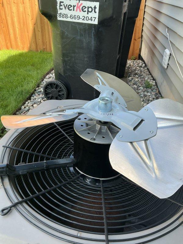 Returned to property to complete quoted repair on air conditioning system. Successfully replaced failed condenser fan motor and damaged fan blade assembly. Removed old motor and blade from outdoor unit, installed new OEM replacement components, verified proper rotation and clearance, and tested system operation. Unit running efficiently with proper airflow restored.
