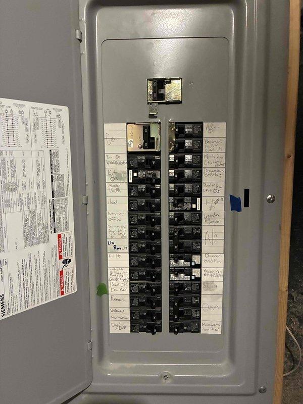 Conducted on-site evaluation for whole house Generac generator installation at a 15-year-old single-family residence with no existing backup power system. Assessed mechanical room containing water heater, HVAC equipment, and associated plumbing infrastructure to determine optimal generator placement and utility connections. Evaluated existing electrical panel configuration, documenting breaker arrangement and available capacity for automatic transfer switch integration. Photographed utility area layout, equipment positioning, and electrical service panel to support equipment sizing recommendations and installation planning.