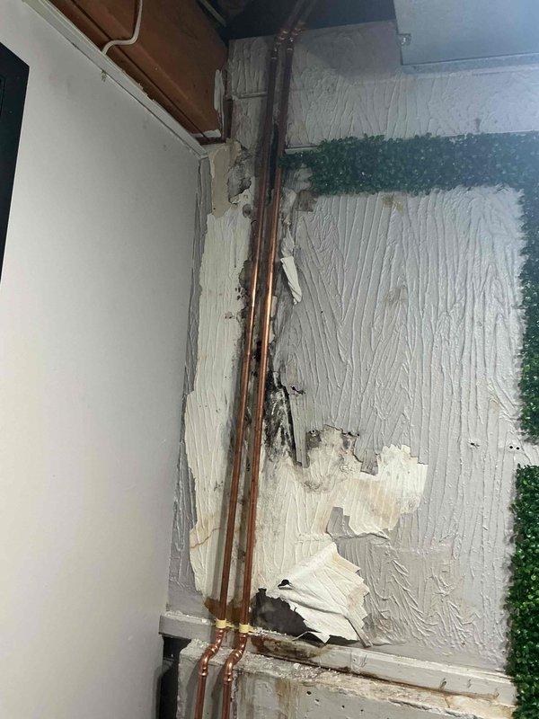 Replaced deteriorated copper piping in utility room mechanical corner, installing new brass fittings and connections to restore proper system function. Work addressed water damage concerns in the affected area, with all plumbing connections tested and verified operational upon completion.