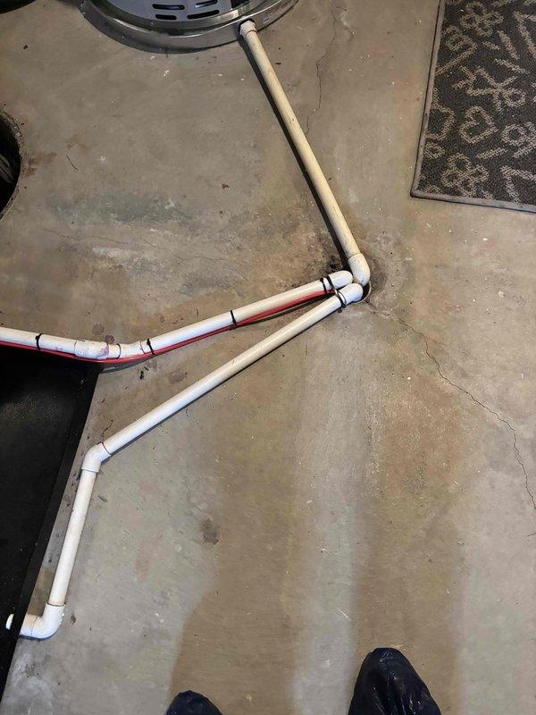 Completed annual cooling maintenance on 2017 EnergiAir system under active warranty coverage through June 2029. Performed comprehensive AC tune-up including inspection of dual outdoor condenser units, verified proper refrigerant levels, cleaned condenser coils, checked electrical connections, and tested system operation. Inspected interior condensate drain system with PVC piping configuration and verified proper drainage function. All components operating within manufacturer specifications with no deficiencies noted at time of service.