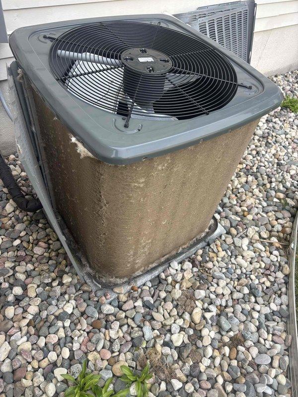Completed annual cooling maintenance on 2017 EnergiAir system under active warranty coverage through June 2029. Performed comprehensive AC tune-up including inspection of dual outdoor condenser units, verified proper refrigerant levels, cleaned condenser coils, checked electrical connections, and tested system operation. Inspected interior condensate drain system with PVC piping configuration and verified proper drainage function. All components operating within manufacturer specifications with no deficiencies noted at time of service.