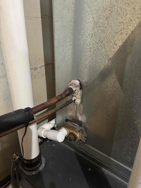 Responded to cooling complaint where one room was not receiving adequate airflow. Inspected six-month-old EnergiAir furnace installation and identified multiple deficiencies from previous installation work. Found deteriorated putty seal at furnace-to-ductwork connection point that was failing due to heat exposure, compromising system efficiency and contributing to airflow issues. Removed degraded sealant material and properly resealed connection using high-temperature rated mastic compound appropriate for HVAC applications.

Discovered uncovered exhaust vent termination on exterior of structure that had allowed pest entry. Installed proper vent cap with screening to prevent future wildlife intrusion while maintaining proper ventilation clearances. Performed comprehensive tune-up and inspection on thirty-year-old Amana air conditioning system, including refrigerant level check, electrical component testing, condenser coil cleaning, and airflow verification. Evaluated ductwork throughout