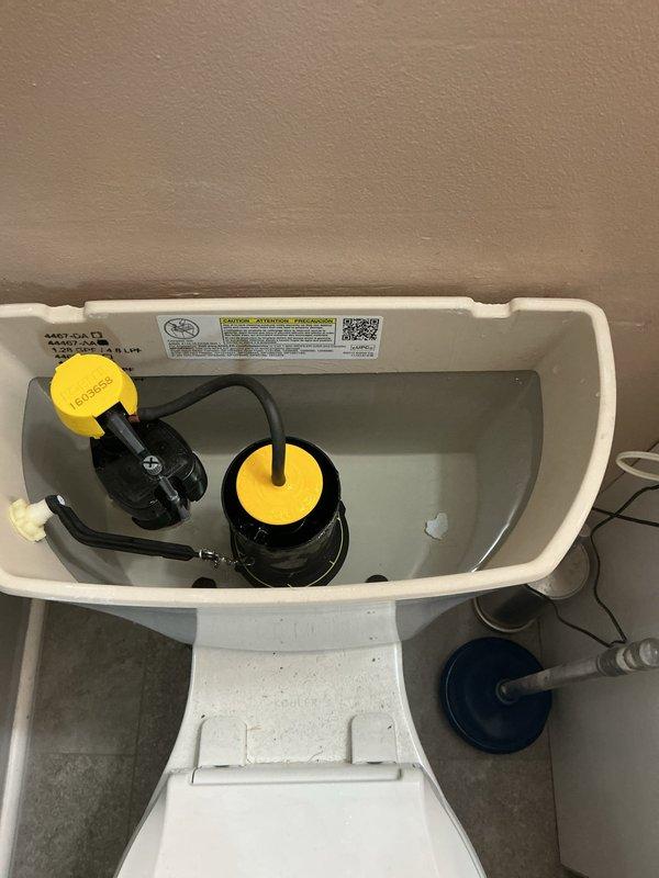 Responded to plumbing issues in two bathrooms following whole home re-pipe. Addressed dripping shower faucet caused by improperly sealed gasket, inspected and corrected repeatedly disconnecting sink drain that was causing flooding, and diagnosed toilet bowl leak requiring water supply manipulation. Inspected toilet tank flush valve assembly and dual flush mechanism, examined shower fixture and tub drain assembly, and documented all plumbing components with photos for service records.