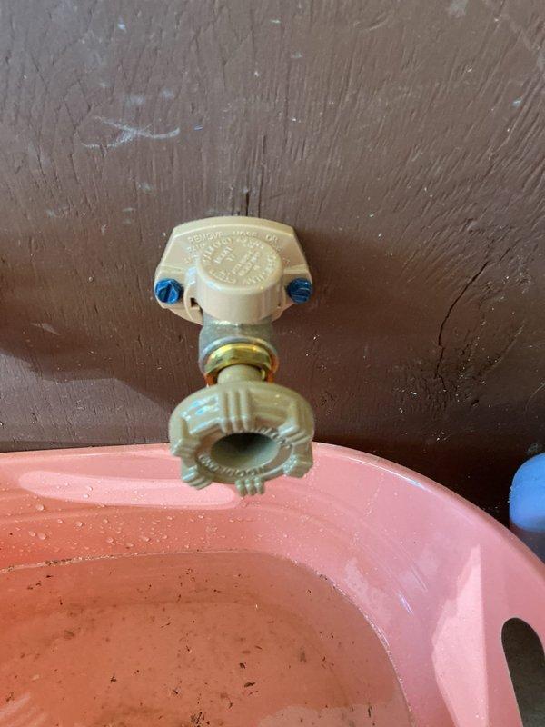 Replaced exterior hose bib mounted on wooden siding with new frost-free sillcock assembly, including copper valve body and proper wall mounting hardware. Installed water hammer arrestor fitting with secure clamp assembly to prevent pressure surges and extend fixture lifespan.