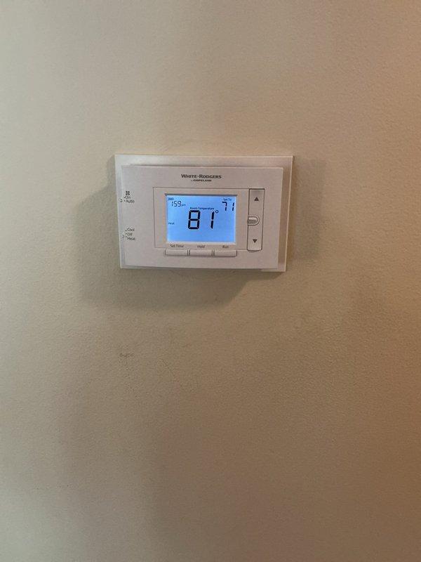 Responded to urgent no-heat call for 25-year-old furnace system affecting entire residence. Upon arrival, performed complete system diagnostic including inspection of HVAC unit, thermostat operation, and heating components. Thermostat displayed ambient temperature of 81°F with setpoint of 71°F, indicating potential system malfunction or sensor issue. Conducted thorough examination of furnace cabinet, verified proper venting and condensate drainage system integrity, and assessed overall unit condition given age of equipment. Restored heat to residence and verified proper system operation before departure.