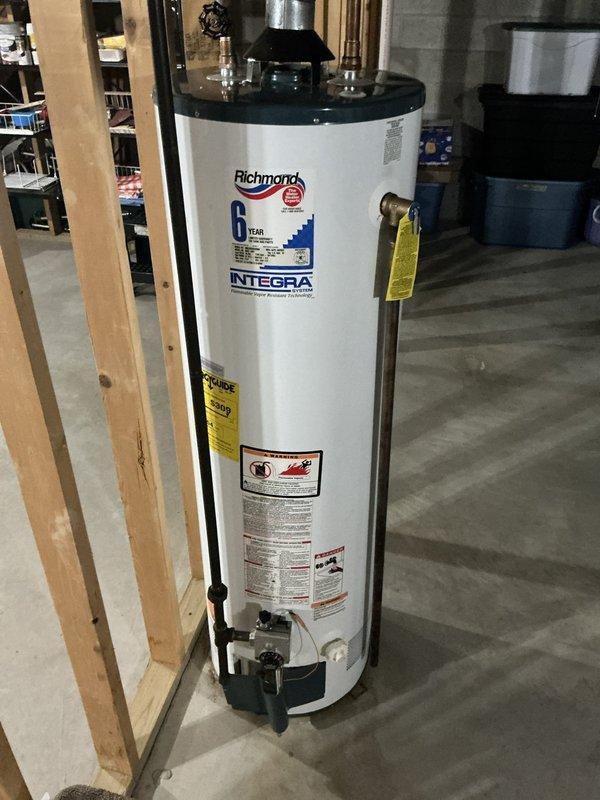 Completed on-site assessment for furnace and air conditioning system replacement estimate. Documented existing HVAC infrastructure including basement ductwork configuration and evaluated installation requirements for new heating and cooling equipment in residential property with unfinished basement utility area.