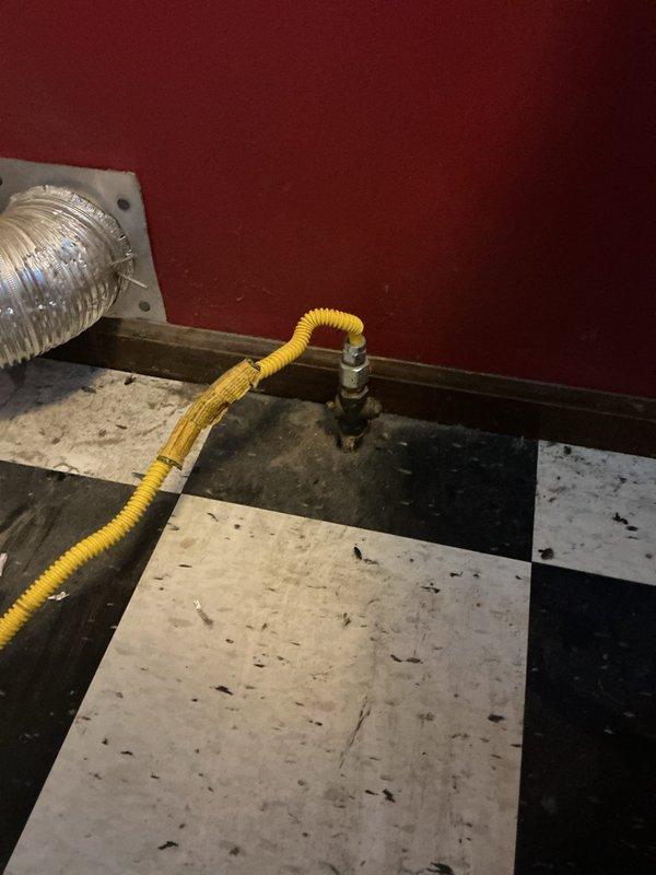 Responded to service call for gas dryer disconnection with stuck shut-off valve. Upon arrival, assessed gas supply line and valve condition, noting valve had seized and required careful manipulation to prevent damage to gas line connections. Successfully freed the stuck valve mechanism and safely disconnected the gas dryer from the supply line, capping the gas line appropriately. Verified no gas leaks at connection point and ensured all components were secure and properly positioned for future appliance installation.