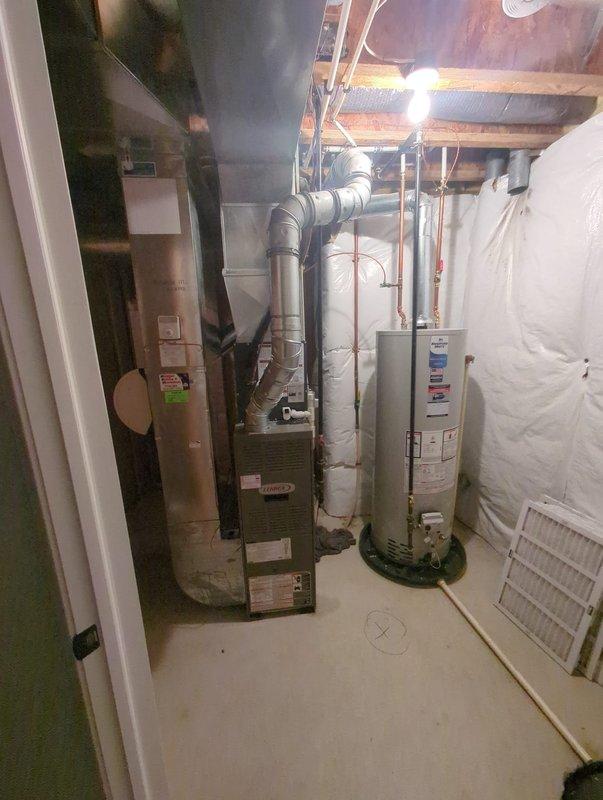 Completed full HVAC system replacement including outdoor condensing unit and indoor air handler. Installed new refrigerant lines with proper brazing and insulation, verified factory refrigerant charge of 65 ounces total, and performed leak test on all connections. Connected new equipment to existing ductwork in basement, ensured proper electrical connections, and commissioned system with startup procedures. Verified proper airflow, temperature differential, and system operation before completion.