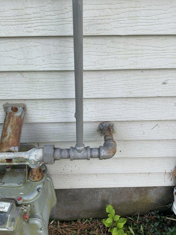 Responded to same-day callback for gas stove malfunction following earlier gas line installation. Upon arrival, inspected newly installed exterior gas line connections and meter assembly for potential leaks or issues that could affect appliance operation. Verified all pipe fittings, elbows, and connections at exterior wall penetration point were properly sealed and functioning correctly. Confirmed gas supply system integrity and resolved issue preventing stove operation.