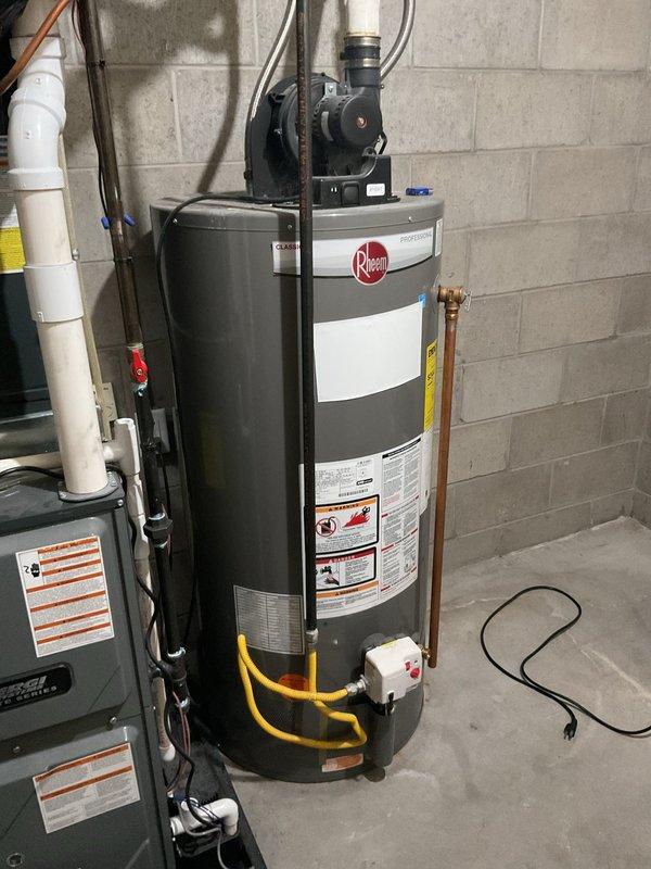 Responded to upstairs master bathroom toilet tank leak. Upon inspection, identified leaking supply line connection at the tank. Replaced faulty supply line with new chrome-finished braided stainless steel line, installed new angle stop valve, and tested system for proper operation with no further leakage detected.