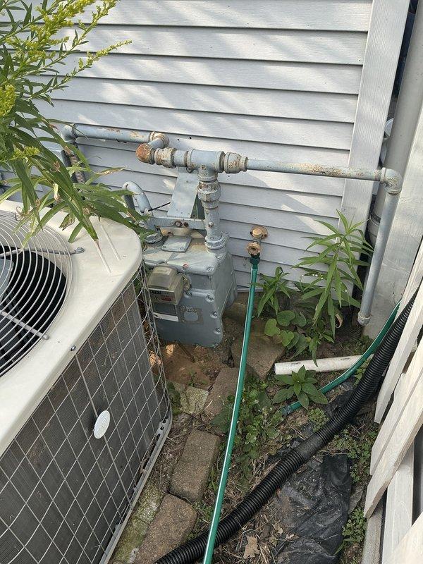 Responded to a no-cooling complaint on a 9-year-old air conditioning system experiencing loud mechanical noise and burning odor from the basement unit. Diagnosed a failing blower motor causing the operational failure. Upon comprehensive inspection of the furnace, identified stage two deterioration on heat exchangers with significant exterior corrosion present. Documented all findings with video evidence and photographic documentation for the client, clearly explaining the safety concerns associated with the compromised heat exchanger condition and the immediate need for system replacement due to multiple critical component failures.
