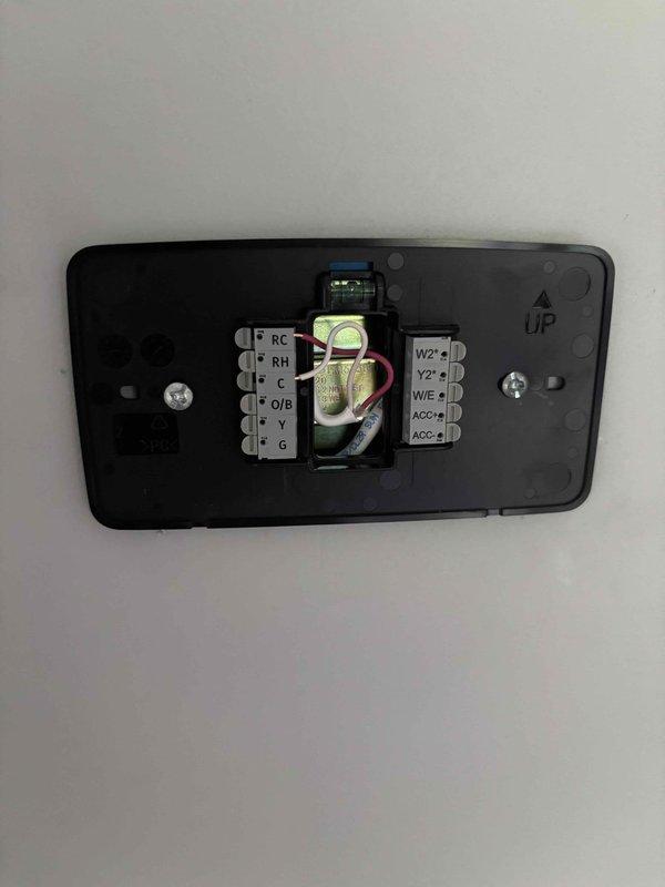 Responded to thermostat issue where previous contractor incorrectly wired replacement thermostat to wrong HVAC zones. Verified wiring at both thermostat terminal blocks and zone control board, corrected wire connections to proper zone terminals, and tested system operation to confirm all zones responding correctly to thermostat commands.