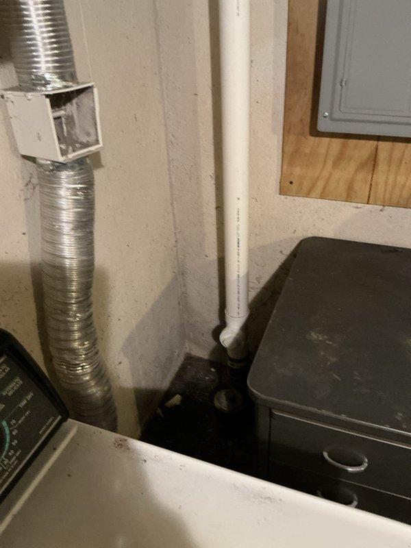 Completed partial drain repipe and cast iron waste pipe replacement in basement utility area. Installed new PVC drainage piping system with proper fittings and elbow joints to replace deteriorated sections. Routed new drain lines through existing joist spaces, ensuring proper slope and support for optimal drainage flow.