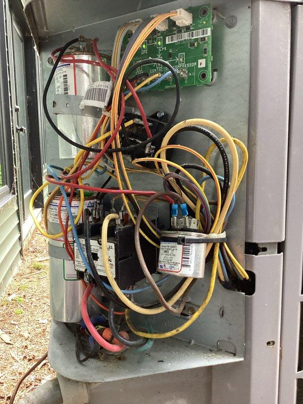Completed annual cooling maintenance on 19-year-old Carrier system. Performed comprehensive tune-up inspection including electrical connections, capacitors, and control board functionality. All wire connections secure with proper terminations, capacitors tested within specifications, control panel components operating normally, system ready for cooling season.
