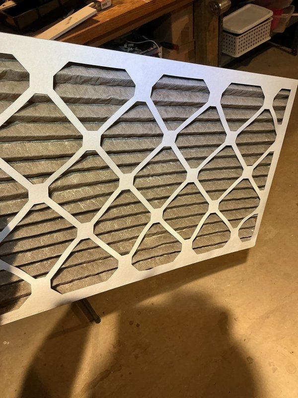Completed annual cooling maintenance on 18-year-old Payne air conditioning system. Discovered evaporator coil heavily frosted during inspection, indicating restricted airflow from severely clogged air filter. Replaced dirty filter with new unit and allowed system to defrost before verifying proper operation and airflow restoration.