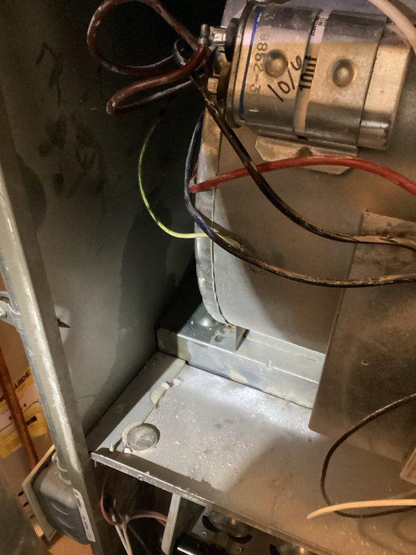 Completed annual cooling maintenance on 17-year-old Carrier AC system, including standard tune-up procedures, system inspection, and performance verification. Observed moisture accumulation and condensation on interior air handler components, indicating normal operation during cooling cycle. Also performed tune-up service on 1-year-old Bradford White water heater with tank flush as time permitted. All equipment operating within normal parameters at time of service completion.