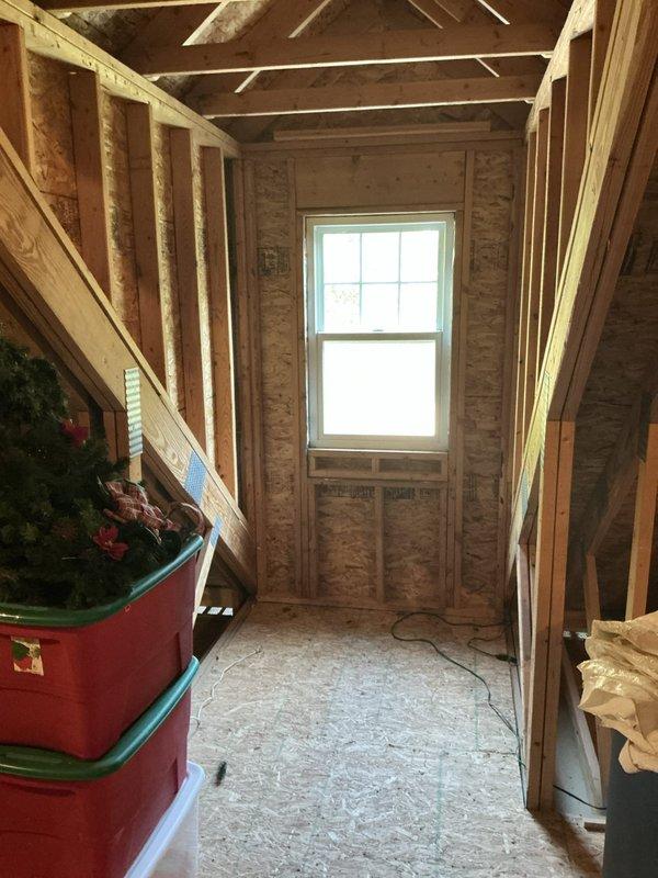 Conducted on-site assessment for new central HVAC system installation at single family residence with 550 square foot bonus room above garage requiring climate control. Evaluated unfinished bonus room space with exposed framing, OSB sheathing, and particle board flooring to determine equipment sizing requirements and installation logistics. Inspected attic access area noting existing electrical wiring, insulation, and available space for ductwork routing to serve the additional square footage. Documented current construction conditions including exposed structural members and utility pathways to develop comprehensive equipment specifications and installation plan for properly sized heating and cooling system.