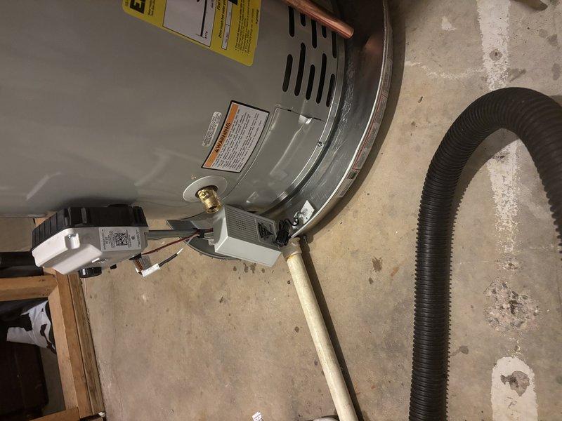 Responded to emergency water heater leak with activated wet switch. Upon arrival, inspected 0-year-old Bradford White water heater (warranty through 02-2027) and identified source of leak. Documented conditions with photos showing unit installation, piping connections, and affected areas. Unit had been shut off prior to arrival as precautionary measure to prevent further water damage.