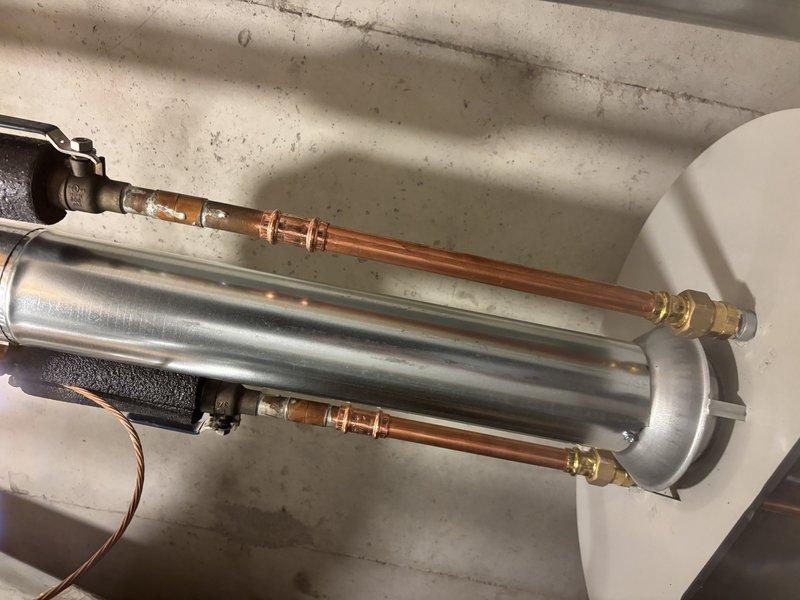 Responded to emergency water heater leak with activated wet switch. Upon arrival, inspected 0-year-old Bradford White water heater (warranty through 02-2027) and identified source of leak. Documented conditions with photos showing unit installation, piping connections, and affected areas. Unit had been shut off prior to arrival as precautionary measure to prevent further water damage.