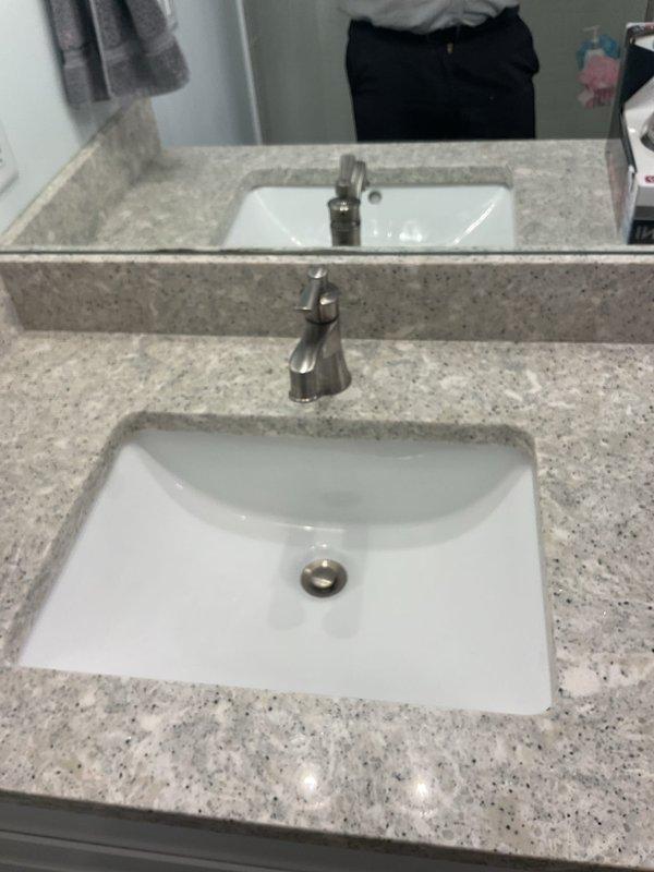 Responded to a residential plumbing service call for clogged drains affecting two bathroom sinks that had been experiencing slow drainage for approximately 2-3 months. Upon arrival, assessed both bathroom sink drains and determined the clogs were isolated to the individual fixture drain lines rather than a main line obstruction. Successfully cleared both drain blockages using appropriate drain cleaning methods, restoring proper water flow and drainage function to both bathroom sinks.

Additionally, installed two Moen Hydro Energetix handheld showerheads as requested. Completed installations included proper mounting of showerhead brackets, connection of flexible hoses, and verification of secure fittings with no leaks. Tested both newly installed showerheads for proper water pressure, spray pattern functionality, and confirmed all connections were watertight. All work performed in a 2019-constructed home with modern plumbing fixtures and granite countertops throughout the bathrooms.