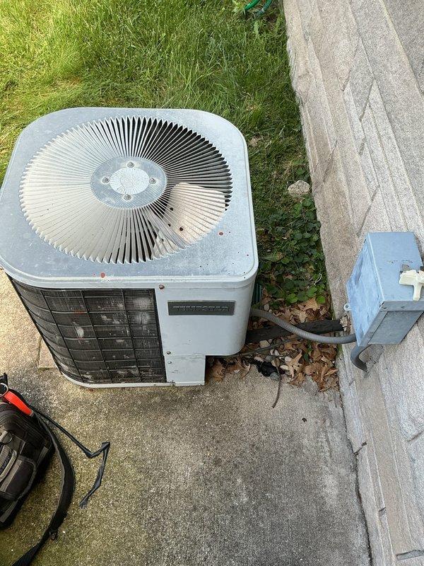 Responded to no cooling complaint on 37-year-old York system. Upon arrival, found that homeowner had reset unit at breaker during lunch break, which resulted in a blown fuse when system was restarted. Replaced failed fuse at outdoor disconnect, verified proper electrical connections, and tested system operation. Unit restored to normal cooling operation with adequate airflow and temperature differential across evaporator coil.