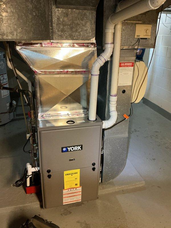Responded to no cooling complaint on 37-year-old York system. Upon arrival, found that homeowner had reset unit at breaker during lunch break, which resulted in a blown fuse when system was restarted. Replaced failed fuse at outdoor disconnect, verified proper electrical connections, and tested system operation. Unit restored to normal cooling operation with adequate airflow and temperature differential across evaporator coil.
